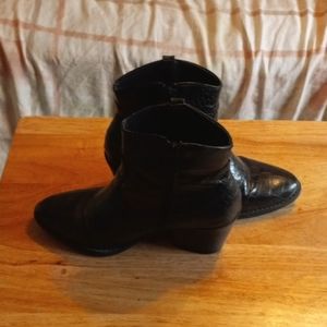 Snake print heeled boots